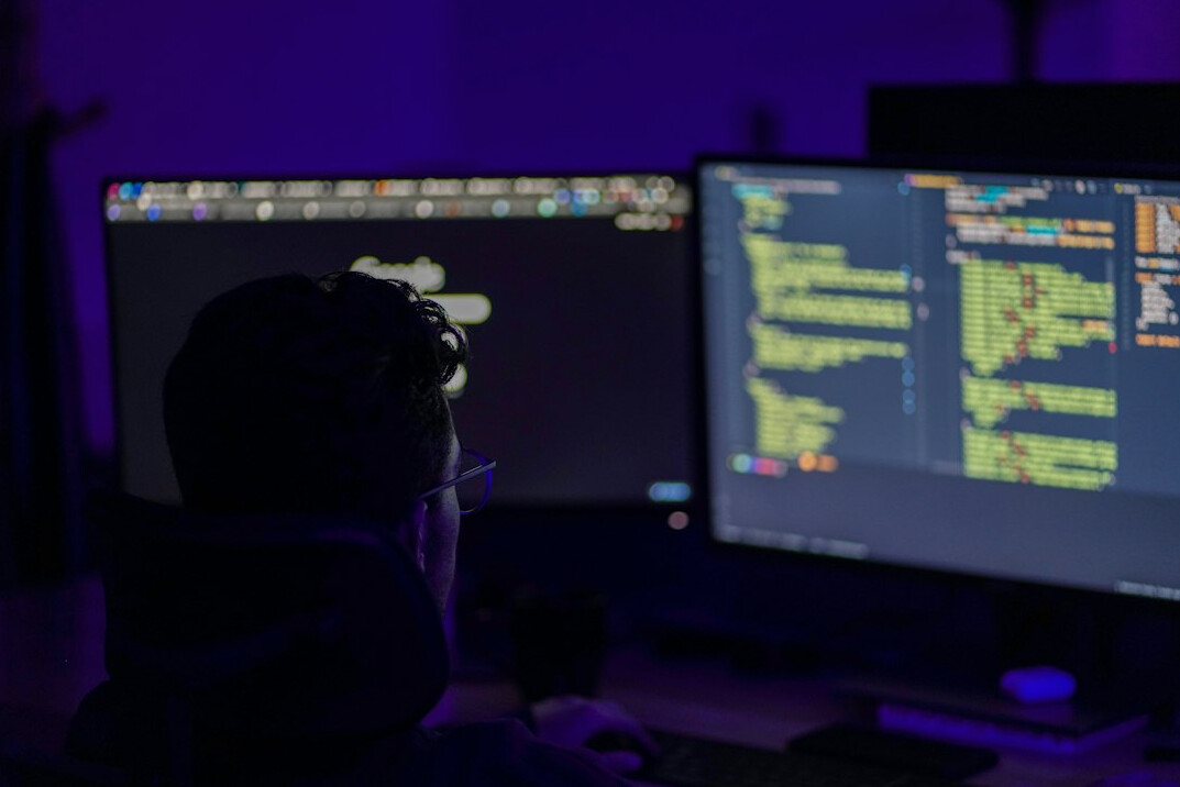 programmer working on code
