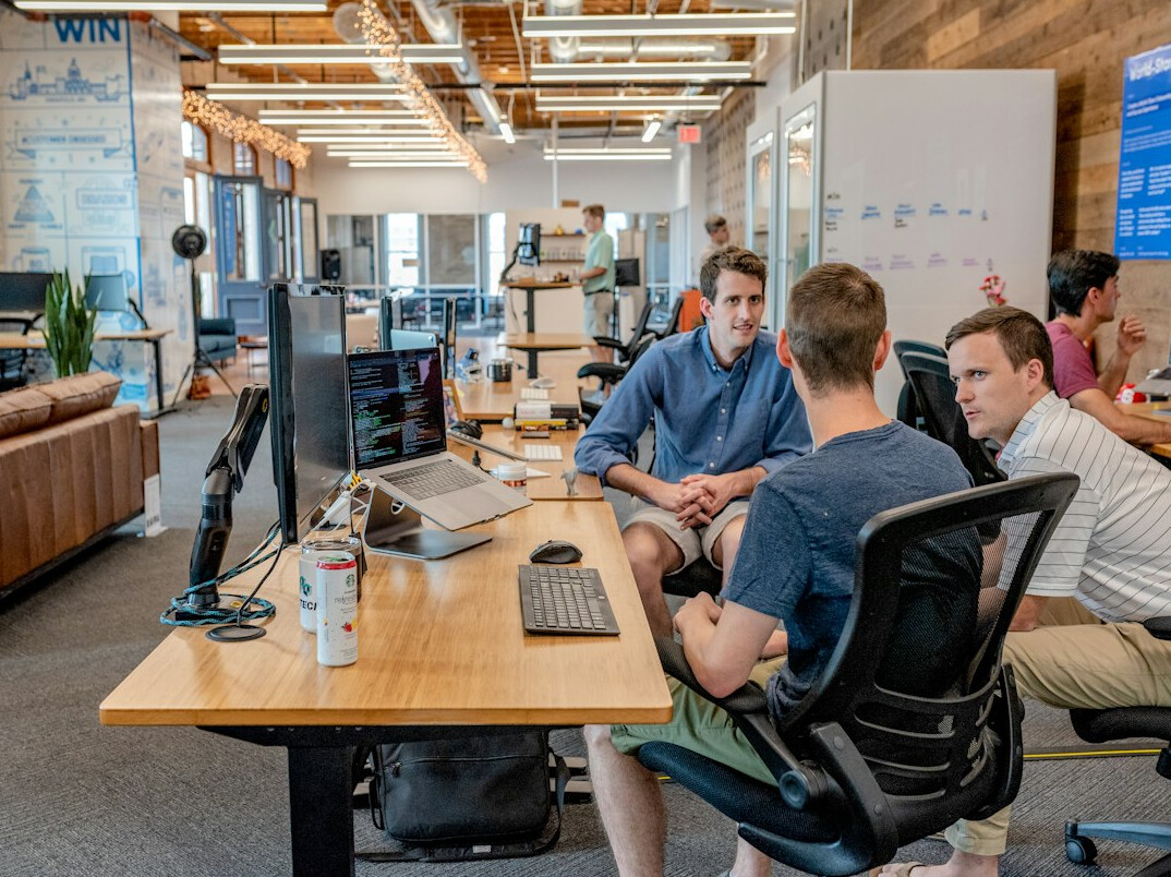 team of developers discussing project