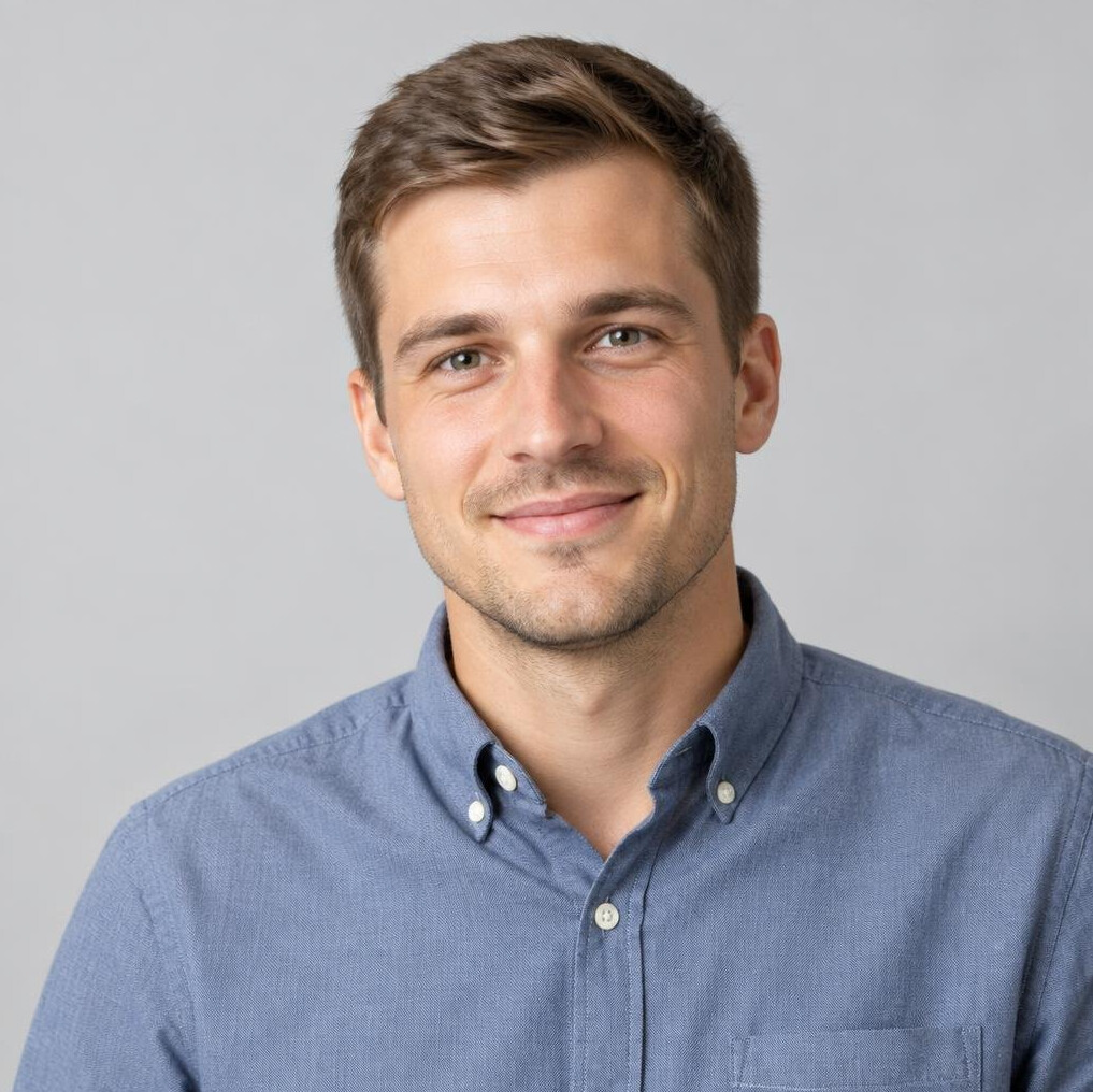 Studio portrait of a smiling young man